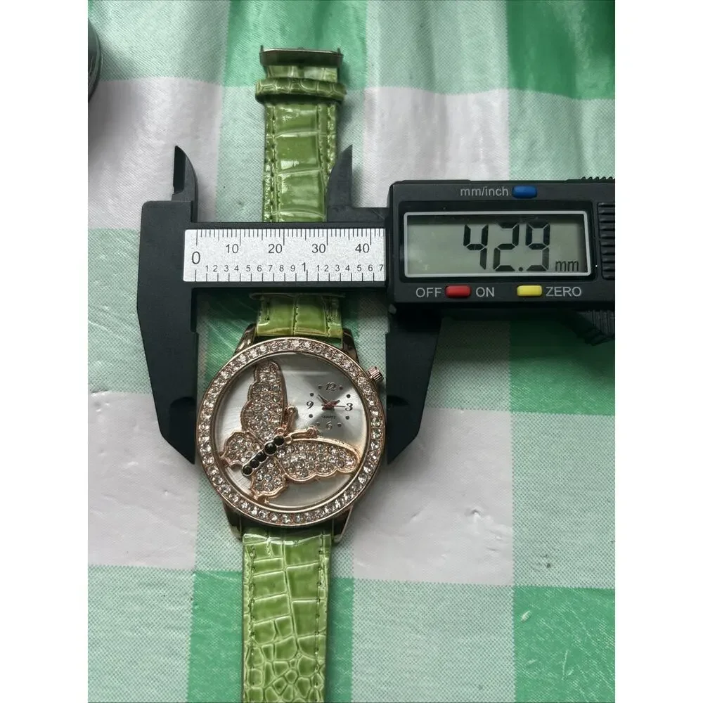 Women’s Rose Gold Tone Butterfly Dial Quartz Watch